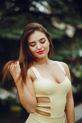 beautiful and stylish girl walking around the city